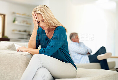 Buy stock photo Woman, upset and mature couple on sofa for fight, disagreement or argument in living room, Conflict, stress and female person with husband for bad communication, divorce or marriage problems in home