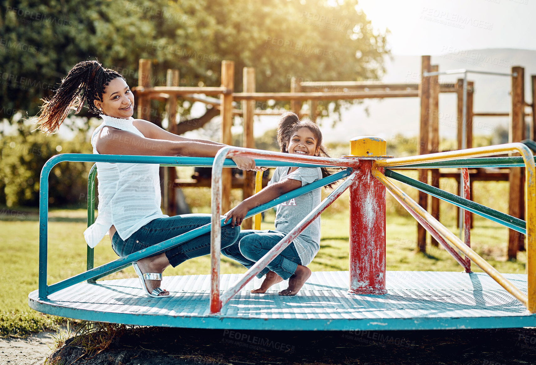 Buy stock photo Mother, child and carousel with playground, bonding and love for summer break and play together. Woman, daughter and park equipment for joy, fun and happy girl smile with countryside merry go round