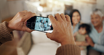 Buy stock photo Phone screen, hands and picture of family in living room with smile, kids and grandparent on sofa. Social media, photo and mother with a baby and grandmother happy in a home together with love