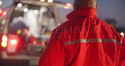 Buy stock photo Back, man and paramedic walking to ambulance for emergency, ems service and healthcare in city. Rear view, medical professional and doctor outdoor at night for first aid, rescue operation and work