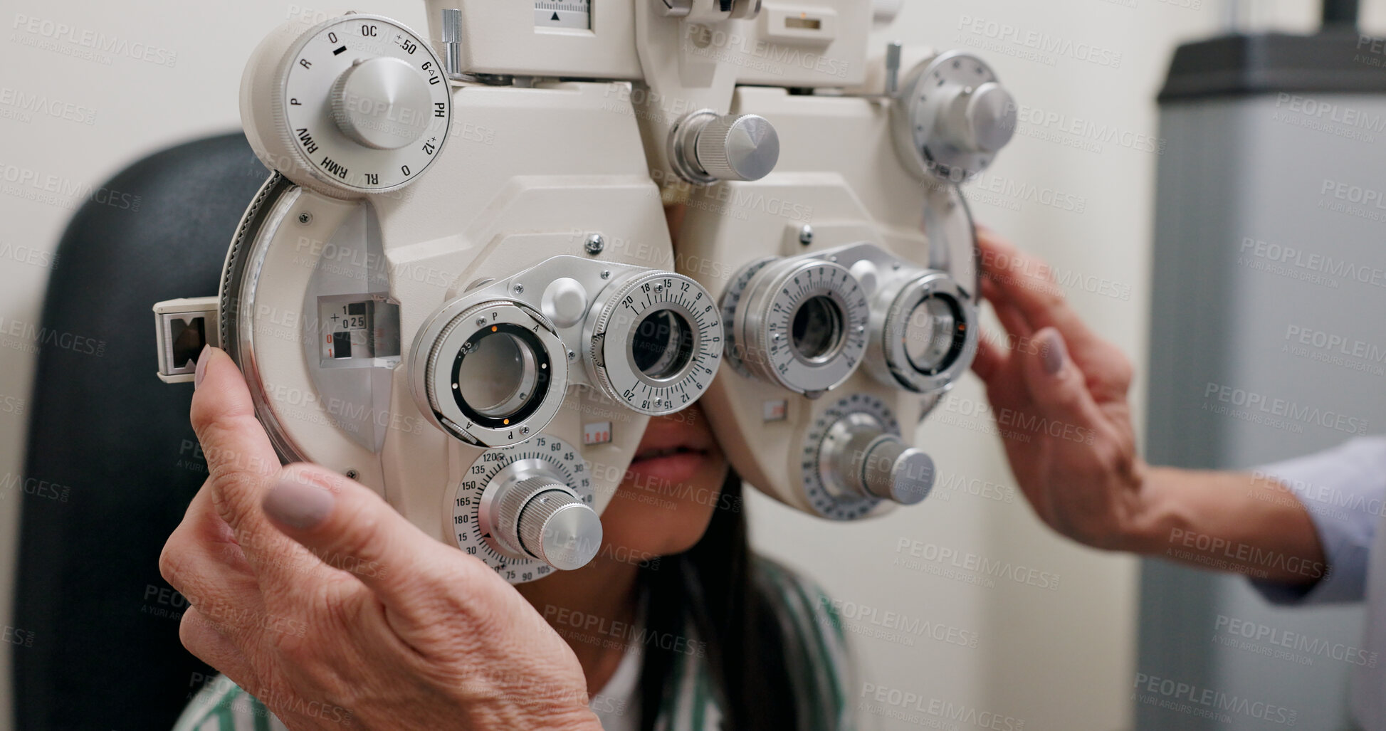 Buy stock photo Child, machine and eye exam for vision in clinic with ophthalmology, optical assessment and healthcare service. Check for eyes, phoropter and girl patient with myopia and medical test for insurance