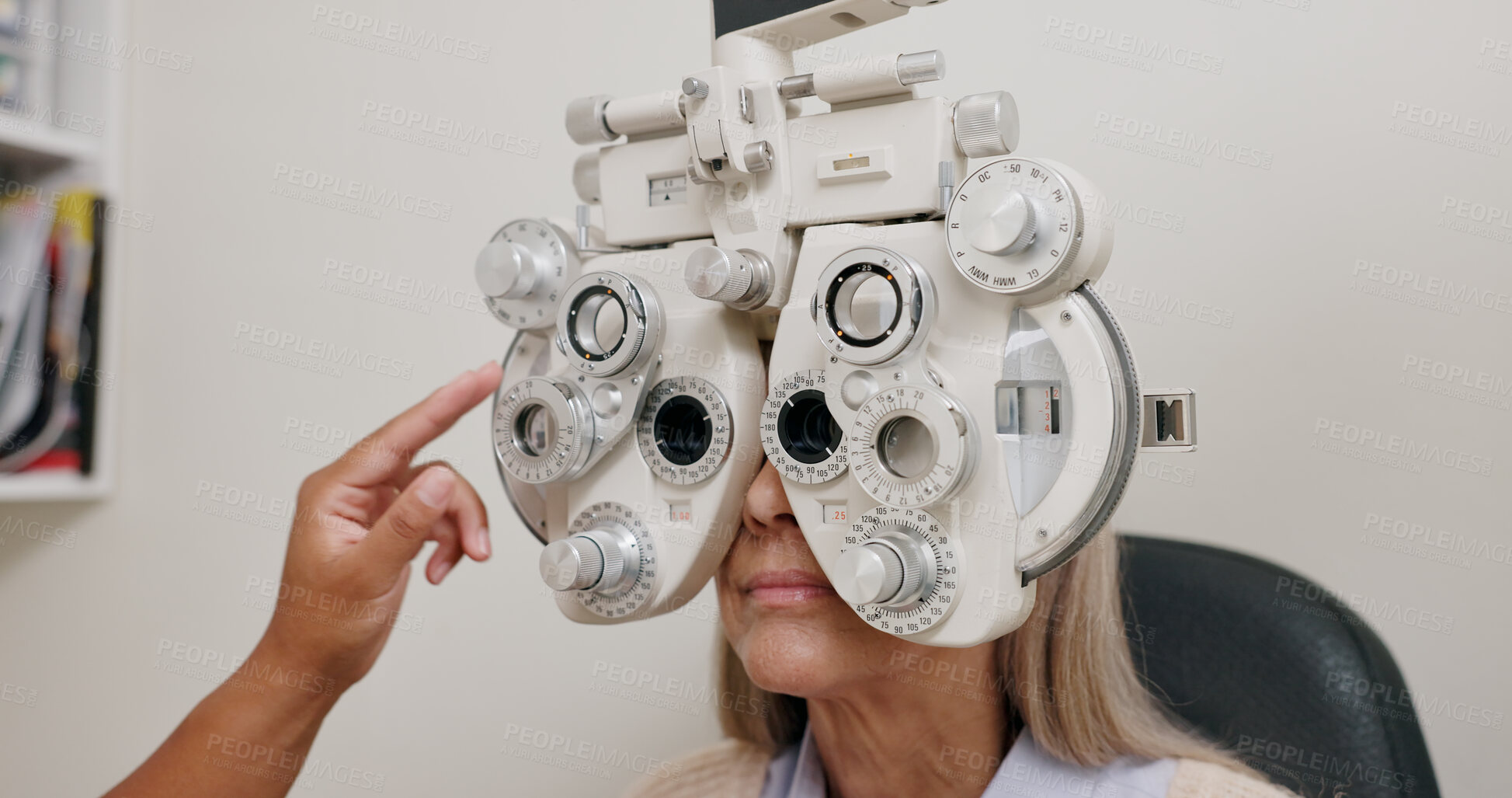 Buy stock photo Phoropter, test and optometrist for vision, eye and medical for optical exam or consultation. Optometry, technology and analysis machine, female patient at professional ophthalmologist clinic