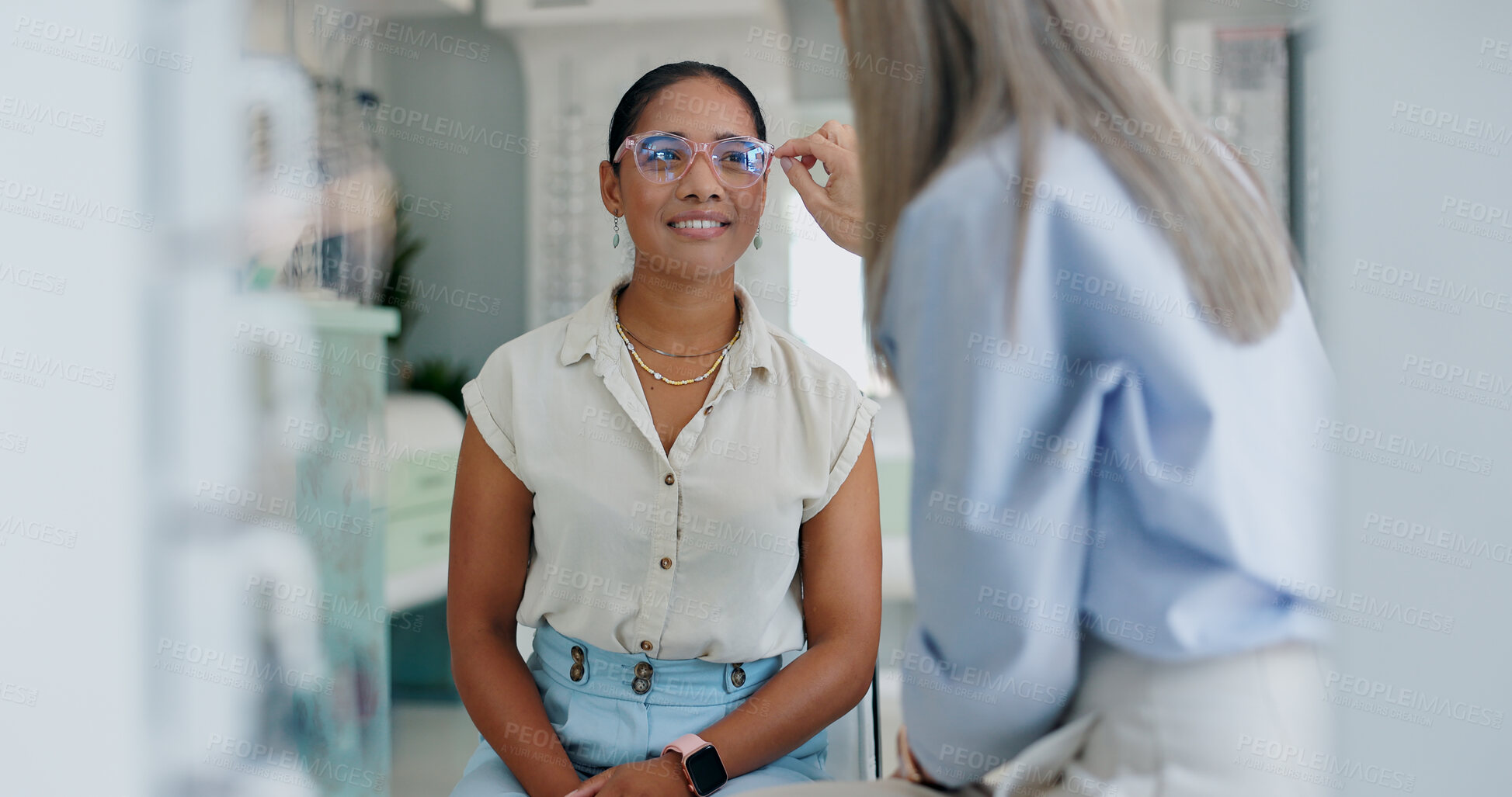 Buy stock photo Woman, optometrist and glasses with vision for lens frame, eye check and advice at ophthalmology clinic. Female customer, spectacles and worker help with exam for healthy eyes and astigmatism test