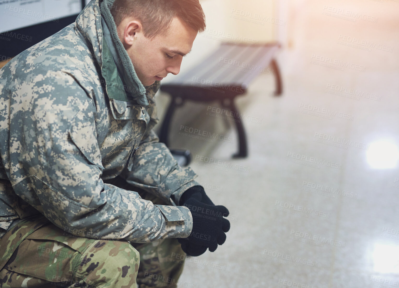 Buy stock photo Soldier man, sad and thinking with mental health, reflection or memory with trauma in corridor. Person, army officer or veteran in grief, ptsd or anxiety for psychology appointment at military base