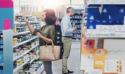 Buy stock photo People, shopping and shelf with pharmaceuticals for medication, self service or healthcare at pharmacy. Man, woman or customers checking medical supplies, stock or inventory at dispensary store