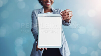 Buy stock photo Blank screen and copyspace on a tablet screen with a woman showing a digital device. Closeup of female hands holding tech product. Portrait of a smiling person posing with and embracing technology