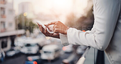 Buy stock photo Person, phone and hands in city for business, connectivity and update schedule in office building. Corporate woman, mobile and scroll on balcony for email, company feedback and latest economy news