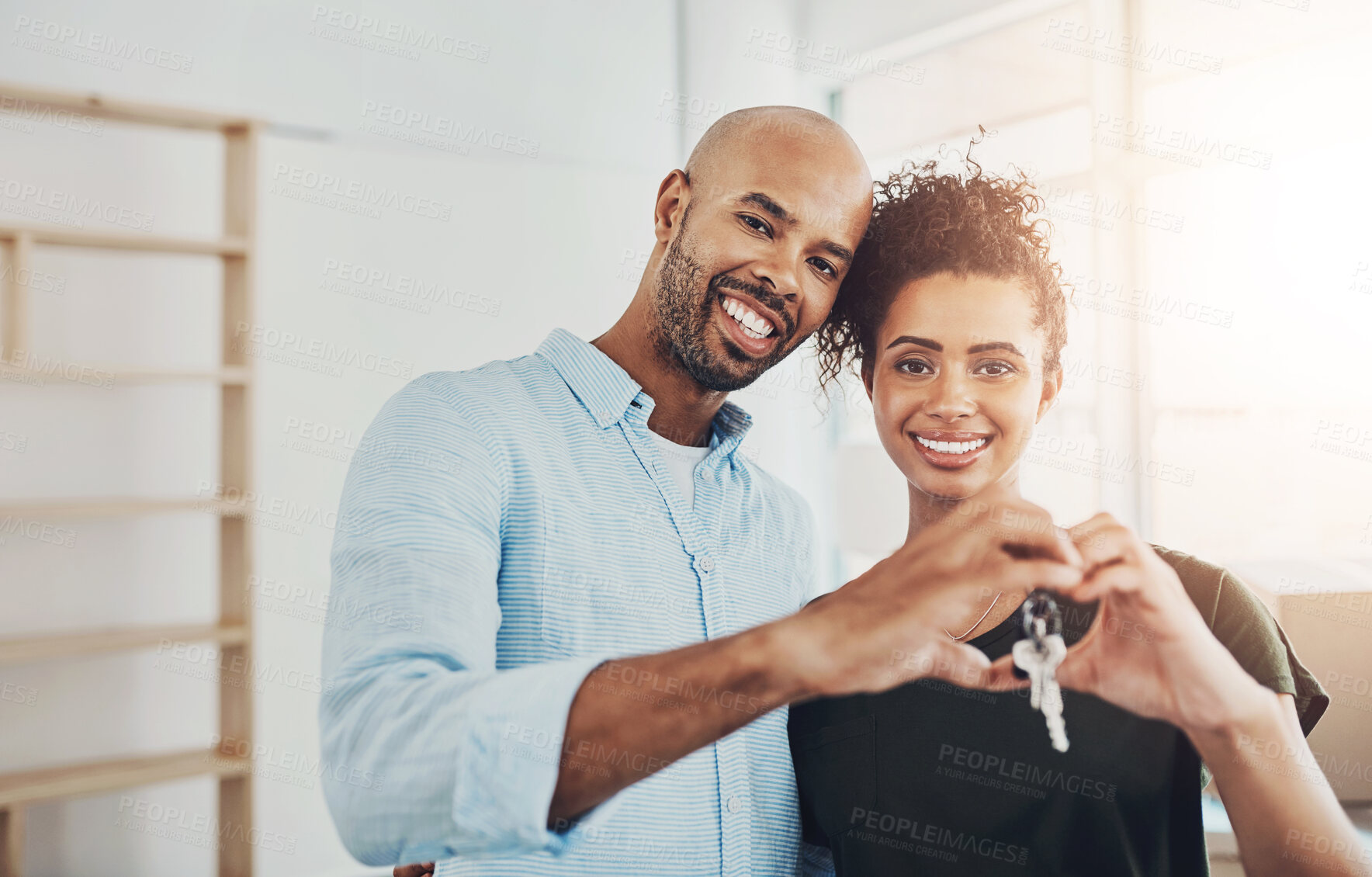 Buy stock photo Couple, portrait and hands with key in heart for property ownership, relocation or support in moving. Happy, man and woman with love emoji at new home in investment, gratitude or real estate security