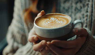 Hands, coffee cup and woman at cafe with latte art, break and caffeine, trend or local experience. Foam, leaf and customer relax with espresso design at a restaurant for weekend, chilling or service