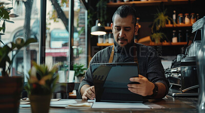 Tablet, industry and man barista in coffee shop working on stock inventory for startup cafe. Reading, small business and male waiter with digital technology for online website in restaurant.