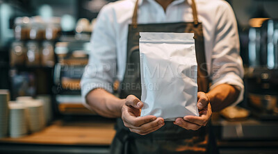 Barista hands, bag and apron in cafe for premium espresso blend, roast and morning drink with caffeine. Employee, packaging and coffee beans for latte in restaurant for energy and breakfast beverage
