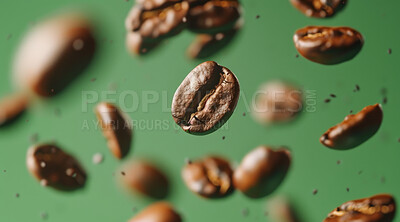 Grain, roast and fresh coffee beans with texture for cappuccino, espresso and natural harvest. Sustainable, ingredients and brown organic seeds for caffeine production in Brazil by green background.
