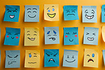 Paper, art or sticky expression drawing on wall for creative, design or storyboard sketch. Classroom, school or autism emotion cards for learning, understanding or autistic student feeling identifier