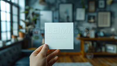 Person, hand and blank card with mockup for note, message or page in living room at home. Closeup of empty paper, poster or small sign for alert, notification or reminder of agenda, memo or tasks