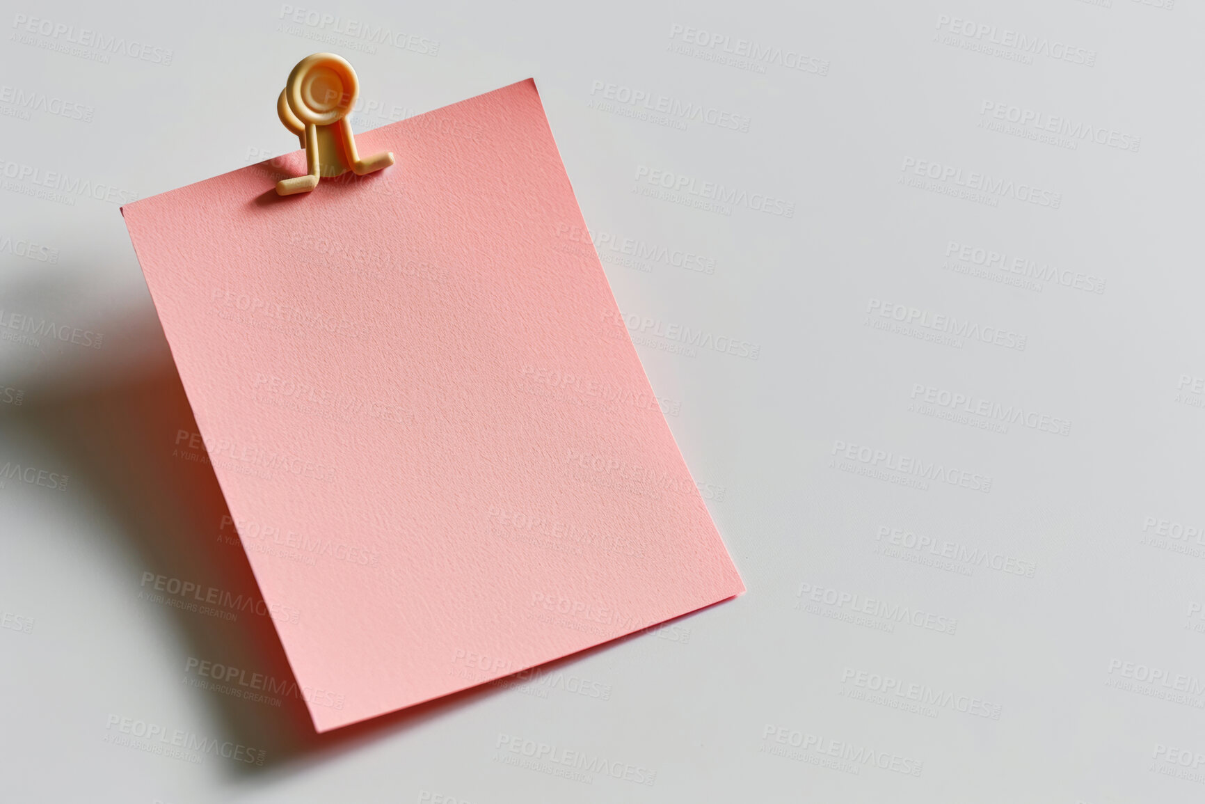 Buy stock photo Sticky note, clip and message with mockup for post, tasks or agenda on a gray studio background. Closeup of document, paper or pink page with alert, review or memo of sign for notice or notification