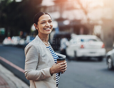 Buy stock photo Shot of a young businesswoman in the city