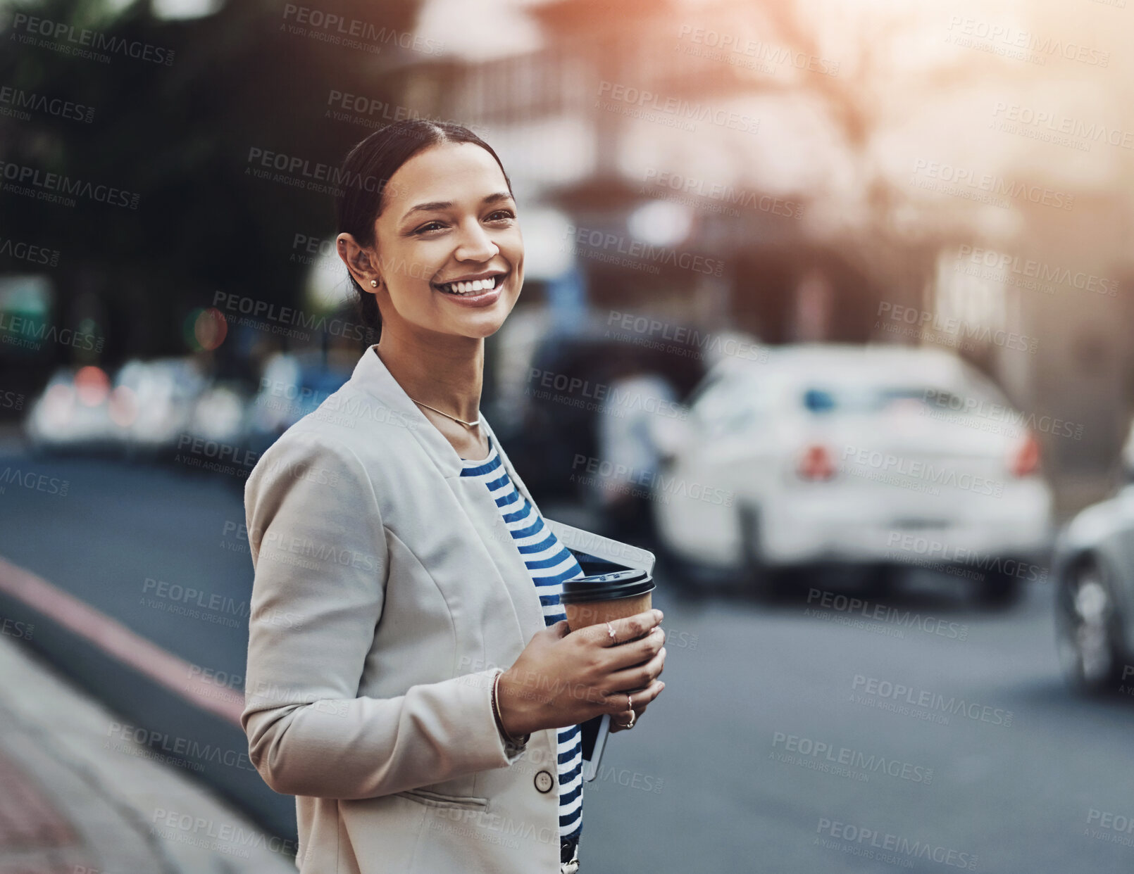 Buy stock photo Shot of a young businesswoman in the city