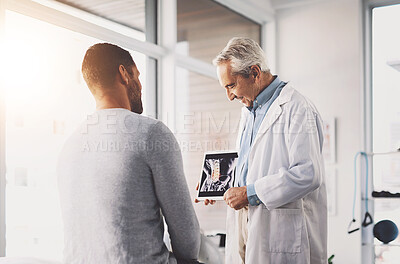 Buy stock photo Doctor, patient and tablet for xray consultation with spine anatomy, diagnosis review or surgery planning. Senior radiologist, man and digital app for health assessment or happy with medical analysis