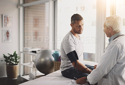 Buy stock photo Exam, man and doctor in clinic for blood pressure, checkup and healthcare assessment test. Advice, patient and medical professional in office for hypertension, heart or health insurance consultation