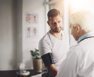 Buy stock photo Doctor, patient and man for blood pressure in consultation with test for hypertension and clinic with wellness check. Medical professional, person and healthcare for vital signs and health assessment