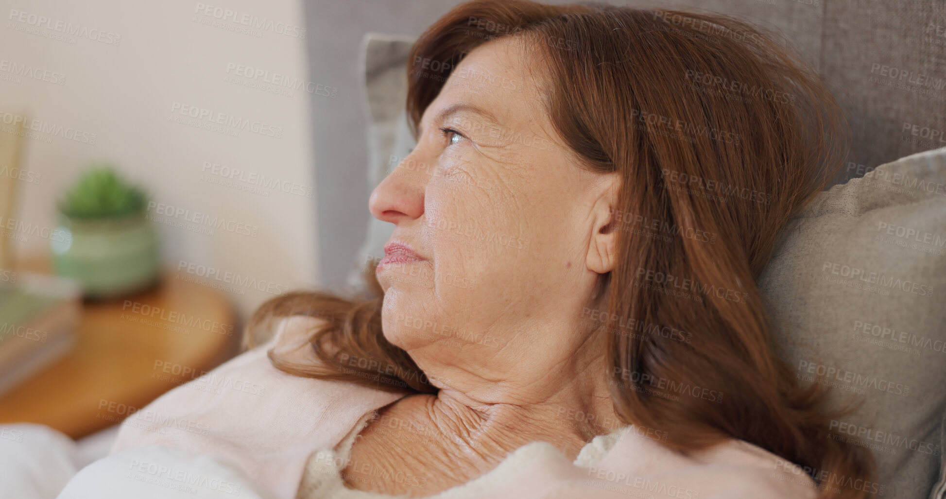 Buy stock photo Bed, elderly woman and sad with thinking in home for nostalgia, mental health and depression. Senior person, dementia and remember or lonely with idea in bedroom for worry and retirement in hospice