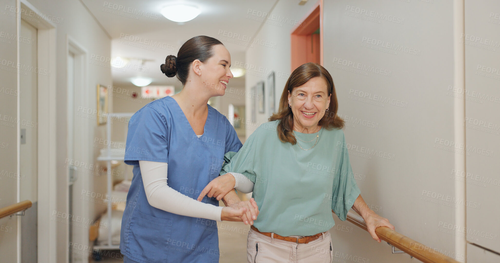 Buy stock photo Walking, hospital and nurse with woman for help, support and care for medical service after surgery. healthcare, clinic and worker with patient in corridor for wellness, rehabilitation and nursing