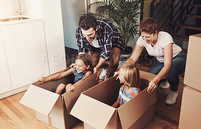 Buy stock photo Family, new home and excited children in boxes for real estate, property relocation or celebration for moving day. Parents, kids and fun in cardboard package with mortgage investment or house success