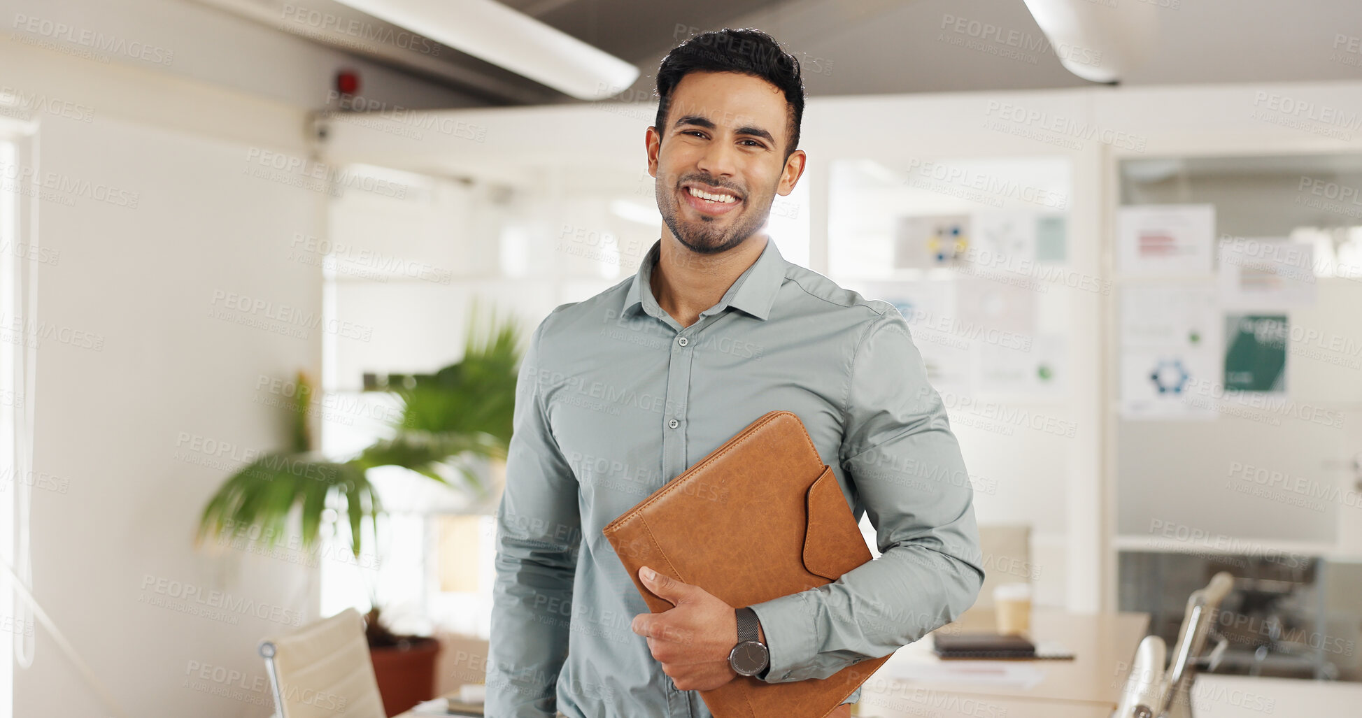 Buy stock photo Business man, startup and face with smile in modern office with confidence, pride and excited for career growth. Person, employee and happy in workplace for portrait at creative media agency in Qatar