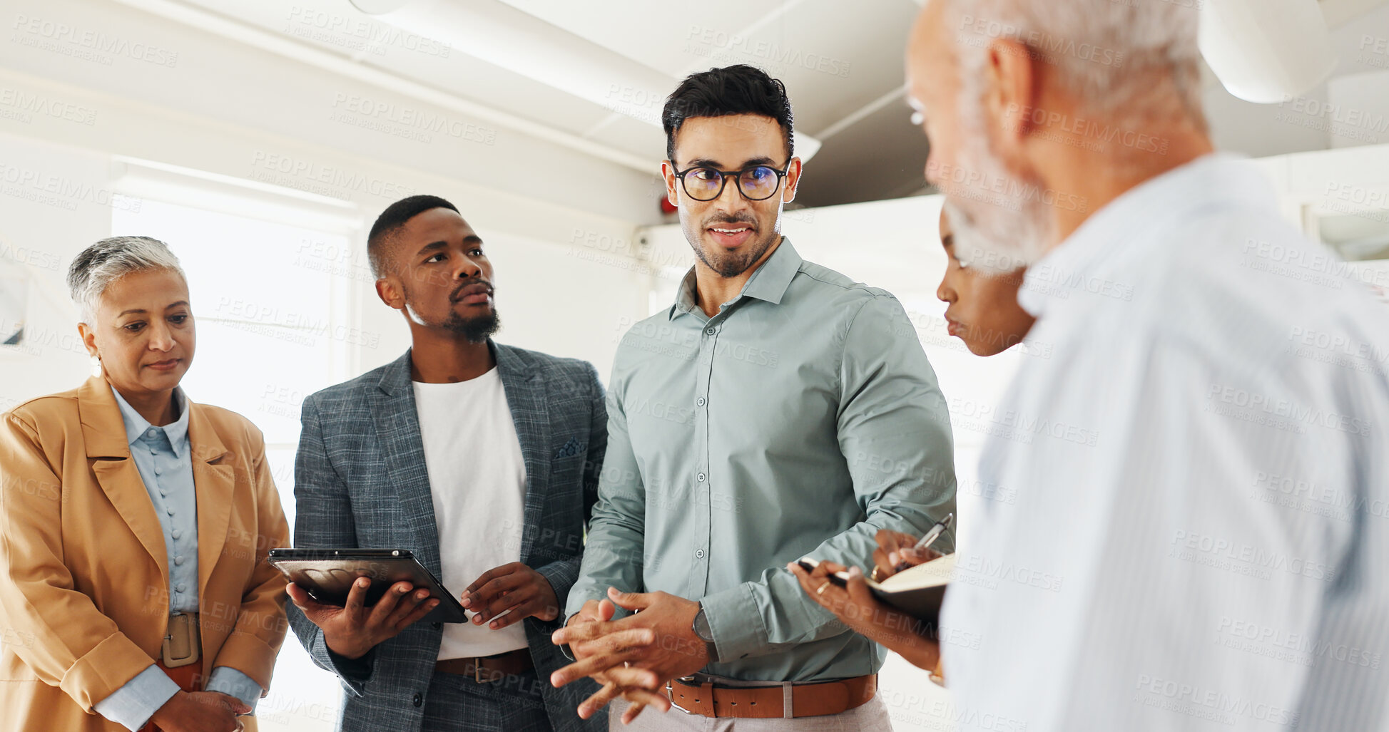 Buy stock photo Business people, laptop and talking in meeting in office with planning and creative decision making. Teamwork, professional employees and technology in boardroom for project feedback or brainstorming