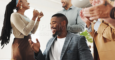 Man, celebration and team with applause by laptop for notification, deal or success in modern office. Group, leader and business people by computer for news, feedback or agreement for project at job
