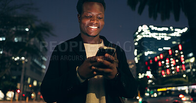 Night, walking and black man with smartphone in city for communication, social media or networking. Smile, contact and happy man with mobile phone for texting, online notification or typing post
