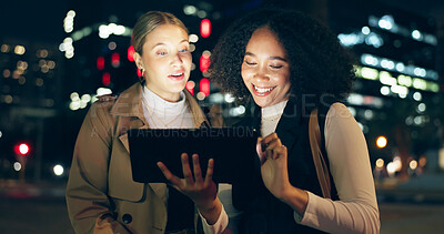 Buy stock photo City, women and discussion with tablet at night for creative planning, website and outdoor travel to work. Happy, friends and smile with tech in street for journey, communication or email of feedback