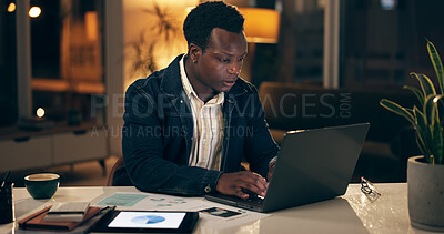 African man, technology and typing at night in office for work, business and company. Investment analyst, laptop and data for stock market, invest and financial growth with dollar in forex trading