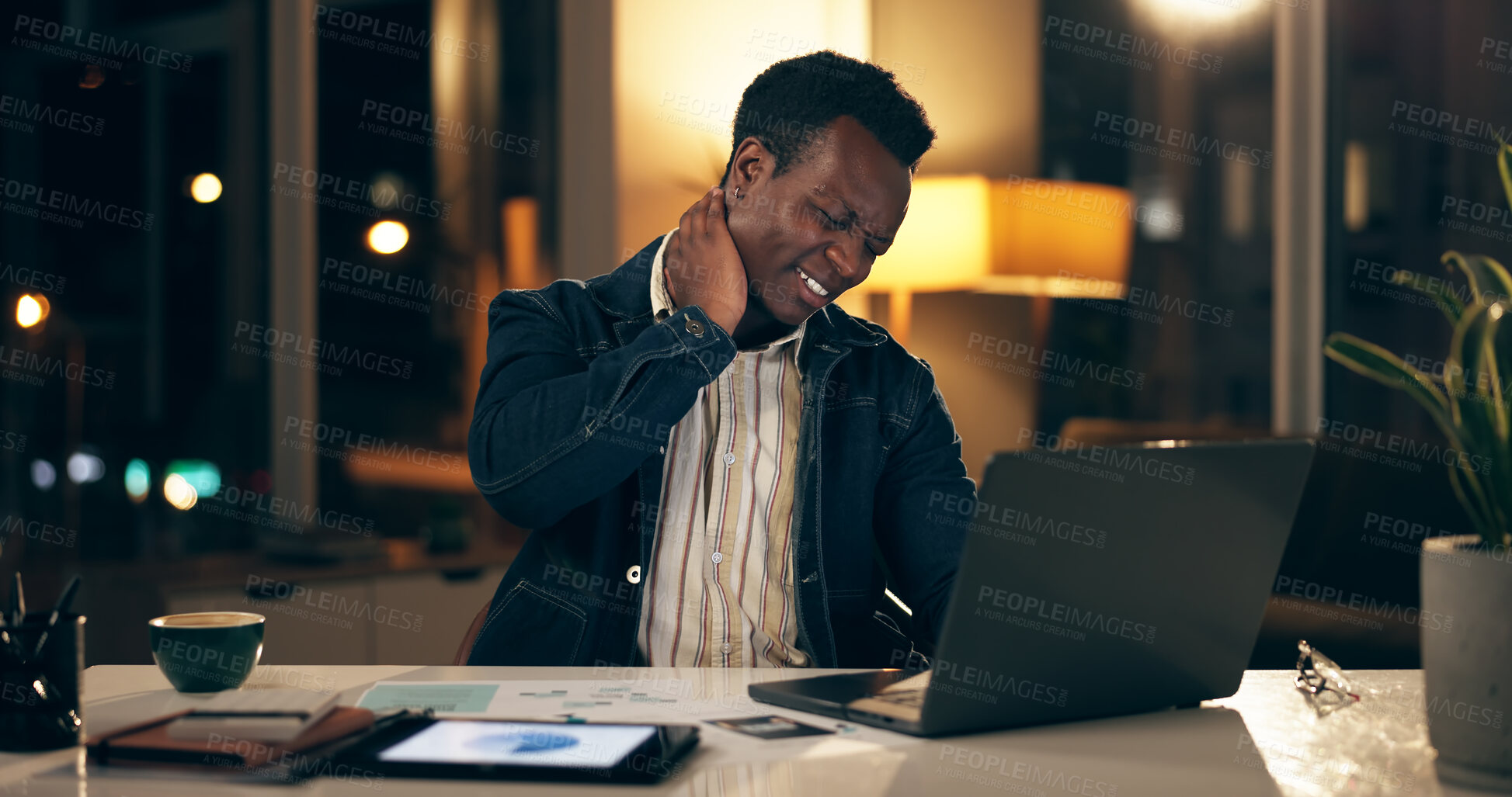 Buy stock photo African man, tech and neck pain at night in office for stress, business and company. Trader, laptop and burnout for stock market, investment and financial risk with anxiety or headache in workplace