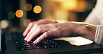 Hands, laptop and typing with business employee in office at night for report, research or review. Computer, information and internet with person closeup at desk in workplace for evening deadline