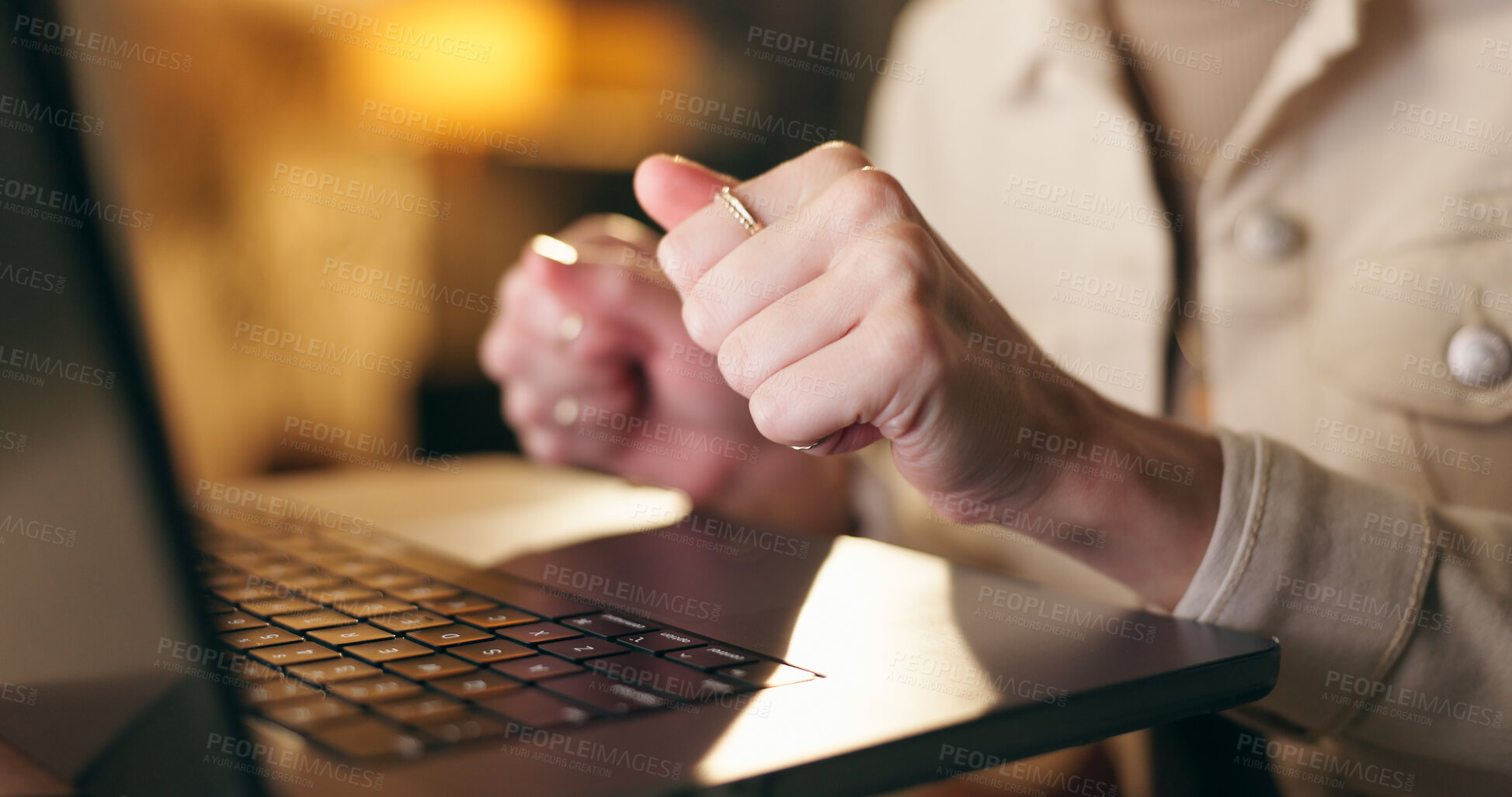 Buy stock photo Hands, laptop and typing with business person in office at night for report, research or review. Computer, information and internet with employee closeup at desk in workplace for evening deadline