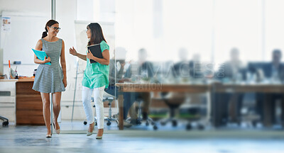 Buy stock photo Creative, woman and walking with discussion in office building for collaboration on designer project for agency. Colleagues, talking and together for partnership or friendship in workplace and ideas.