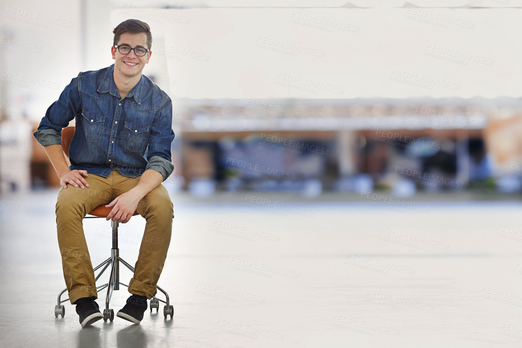 Buy stock photo Chair, business man and portrait sitting with confidence and public relations employee at startup. Happy, mockup space and professional with smile of a consultant ready for working with pride