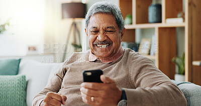 Phone, excited and senior man on sofa with smile, online chat and scroll on internet in home. Connection, networking and happy old person on couch with smartphone for mobile app, good news or relax