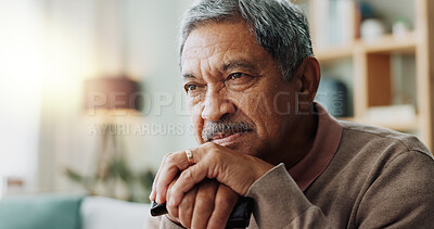 Old man, thinking and cane for home grief or senior remember or retirement, nostalgia or mental health. Male person, thoughts and living room wondering or elderly decision or stress, regret or memory