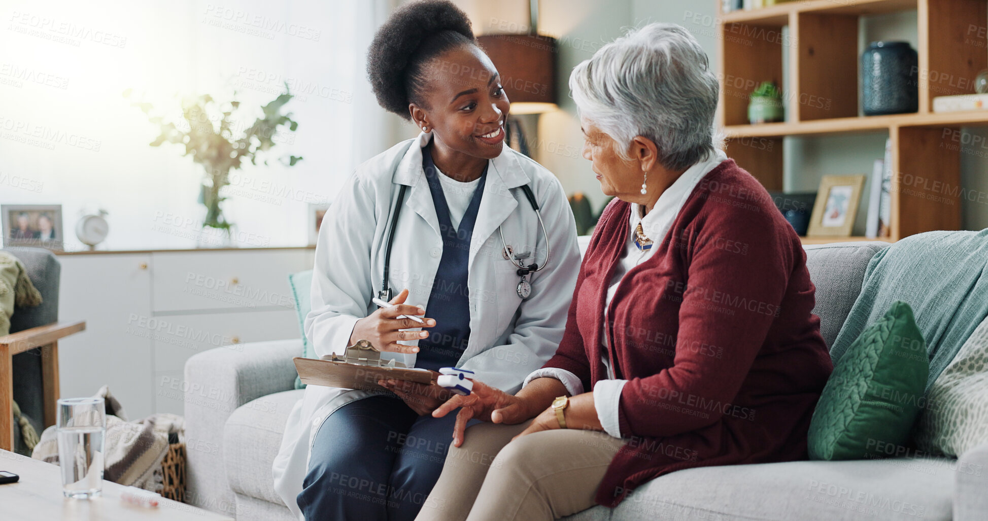 Buy stock photo Black doctor, mature patient or paper in consultation, advice or trust as electronic medical record. Female physician, older woman or tech to support, help or discuss in professional health clinic