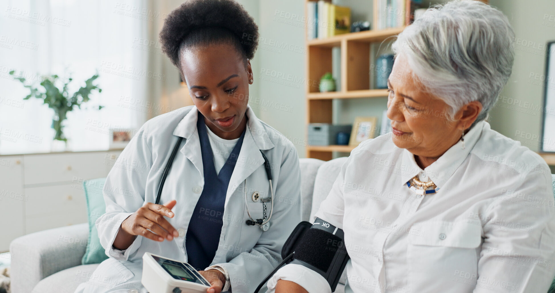 Buy stock photo Senior, woman and doctor with consultation for blood pressure with hypertension diagnosis, medical test or cardiovascular. Elderly patient, nurse and monitor in nursing home for healthcare assessment