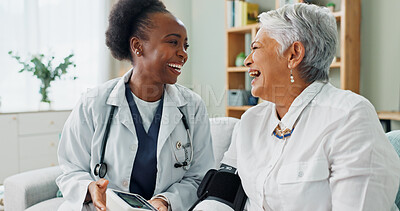 Buy stock photo Elderly, woman and doctor with monitor for blood pressure with hypertension diagnosis, medical test and cardiovascular. Senior patient, nurse and laughing in nursing home for healthcare assessment