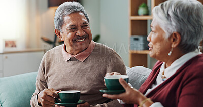 Living room, relax and elderly couple with coffee for love, bonding and funny conversation. Senior people, smile and happy with drink for morning discussion, communication and peace in retirement