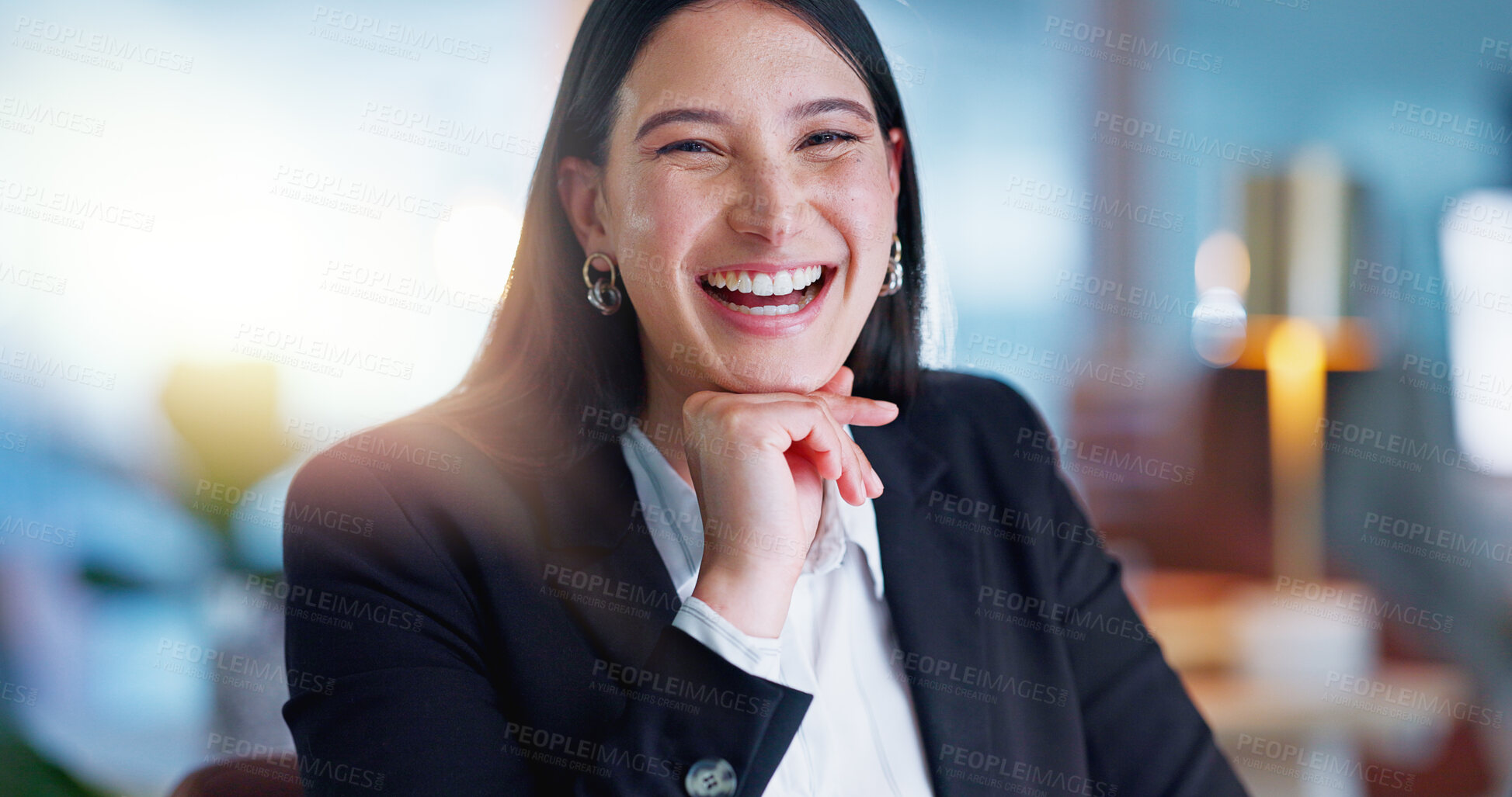 Buy stock photo Face, smile and a business woman laughing in her office at work looking happy with her corporate career. Portrait, success and funny with a young professional employee in a company workplace