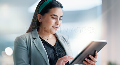 Business woman, tablet and happy for office research or data analysis, social media marketing or funny meme. Young analyst smile or laughing on digital technology, reading feedback and scroll online
