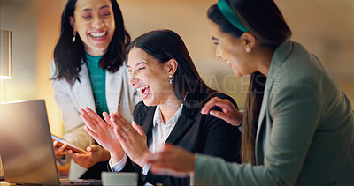 Buy stock photo Excited, business women and clapping in office for success, congratulations or celebration with laptop. Applause, winning and happy employees for company target, promotion or achievement at night