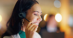 Happy, woman and call center consultant at night in office for customer service, CRM advisory and IT communication. Face, agent and laugh for telecom support, FAQ solution and telemarketing questions