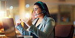 Face, woman and call centre with headset on laptop by explaining, laugh and customer service. Female, person or agent by talk for client for telemarketing, feedback or sale of product of online store