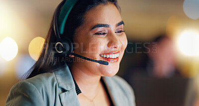 Call center, woman and happy communication at night in office for customer service, CRM advisory and consulting. Face, indian agent and questions for telecom support, contact and telemarketing advice